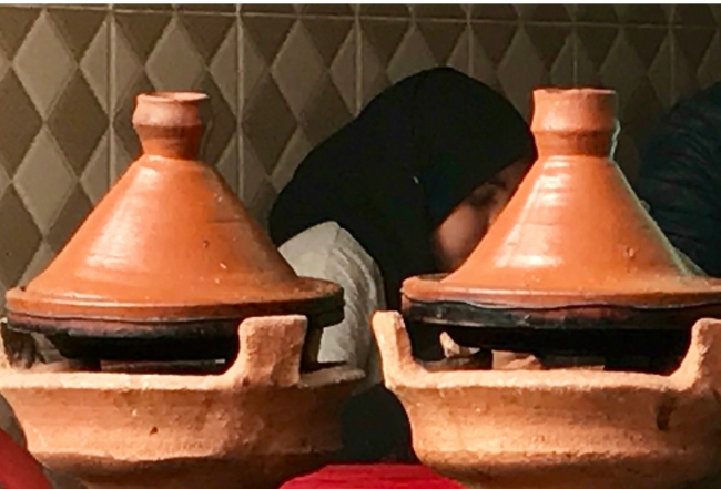 Terra cotta tajines in Marrakech by Angela Dansby